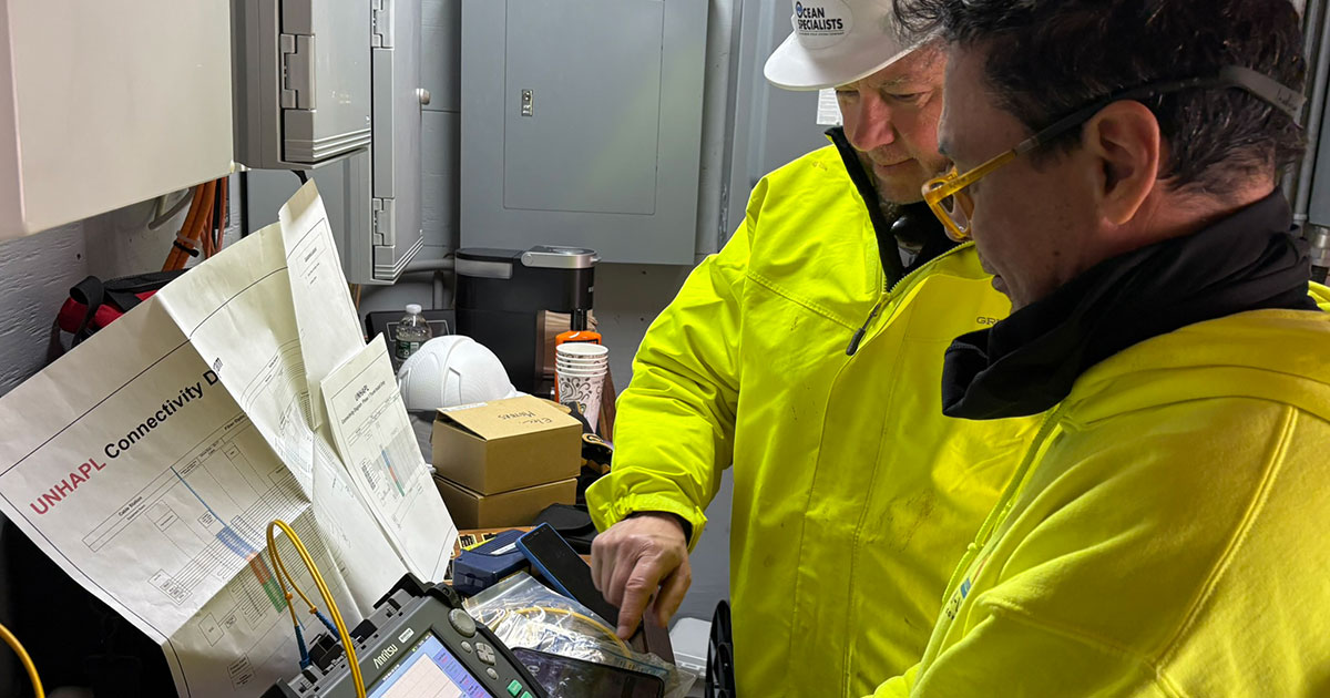 Rich Rogers of OSI reviews OTDR testing with of German Oramas Romero of Tri-Line Cable Consultants, Inc.